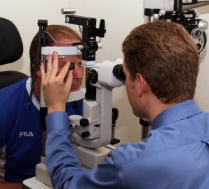 Dr. Brian Abert examines a patient at Vista Eye Care.